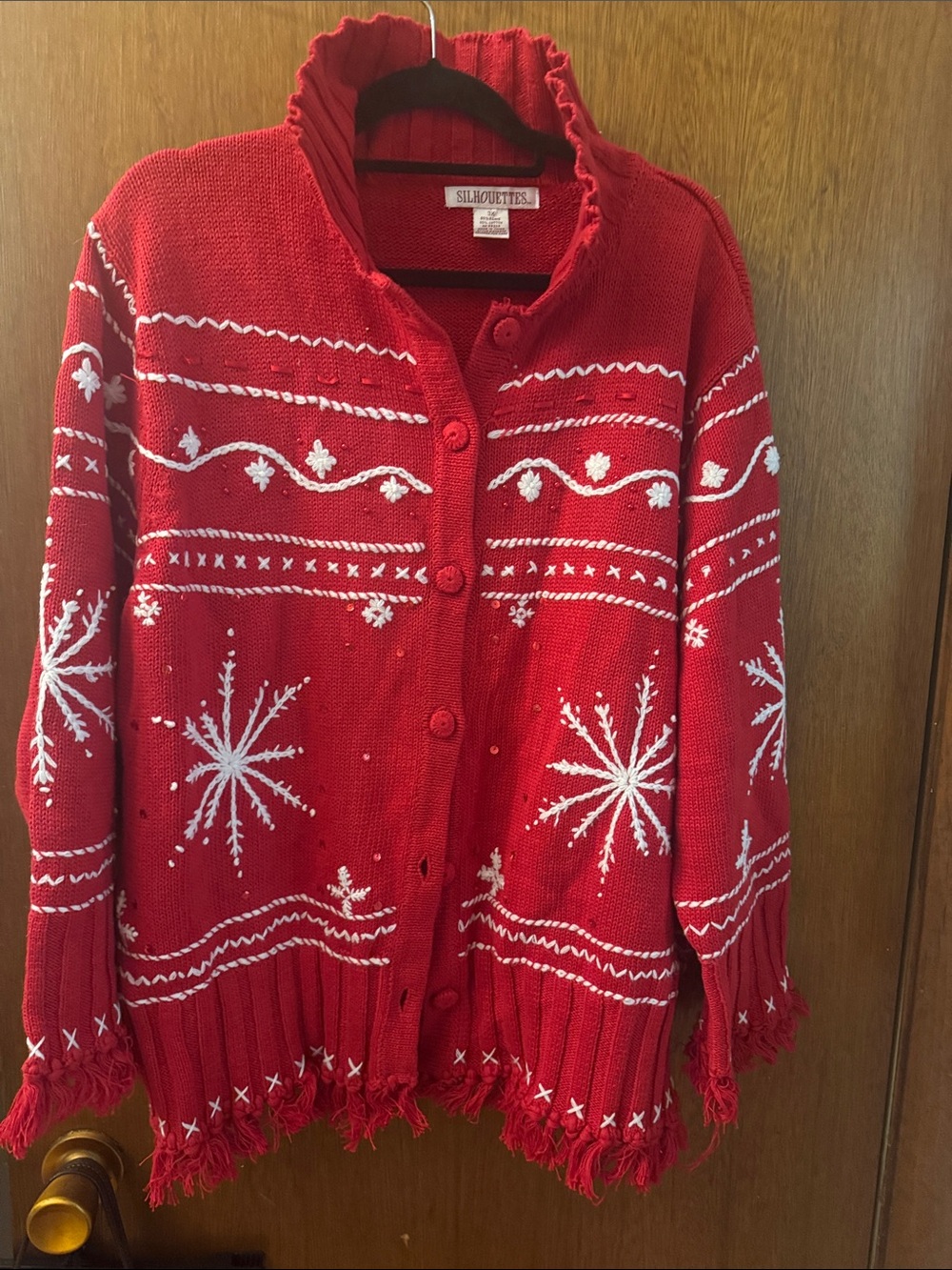 Silhouette Red Cardigan with White Snowflake Pattern and Fringe Trim